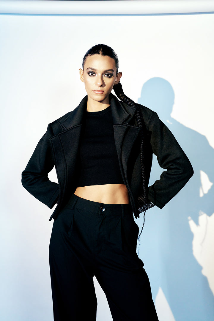 Black blazer jacket with fishnet sleeve