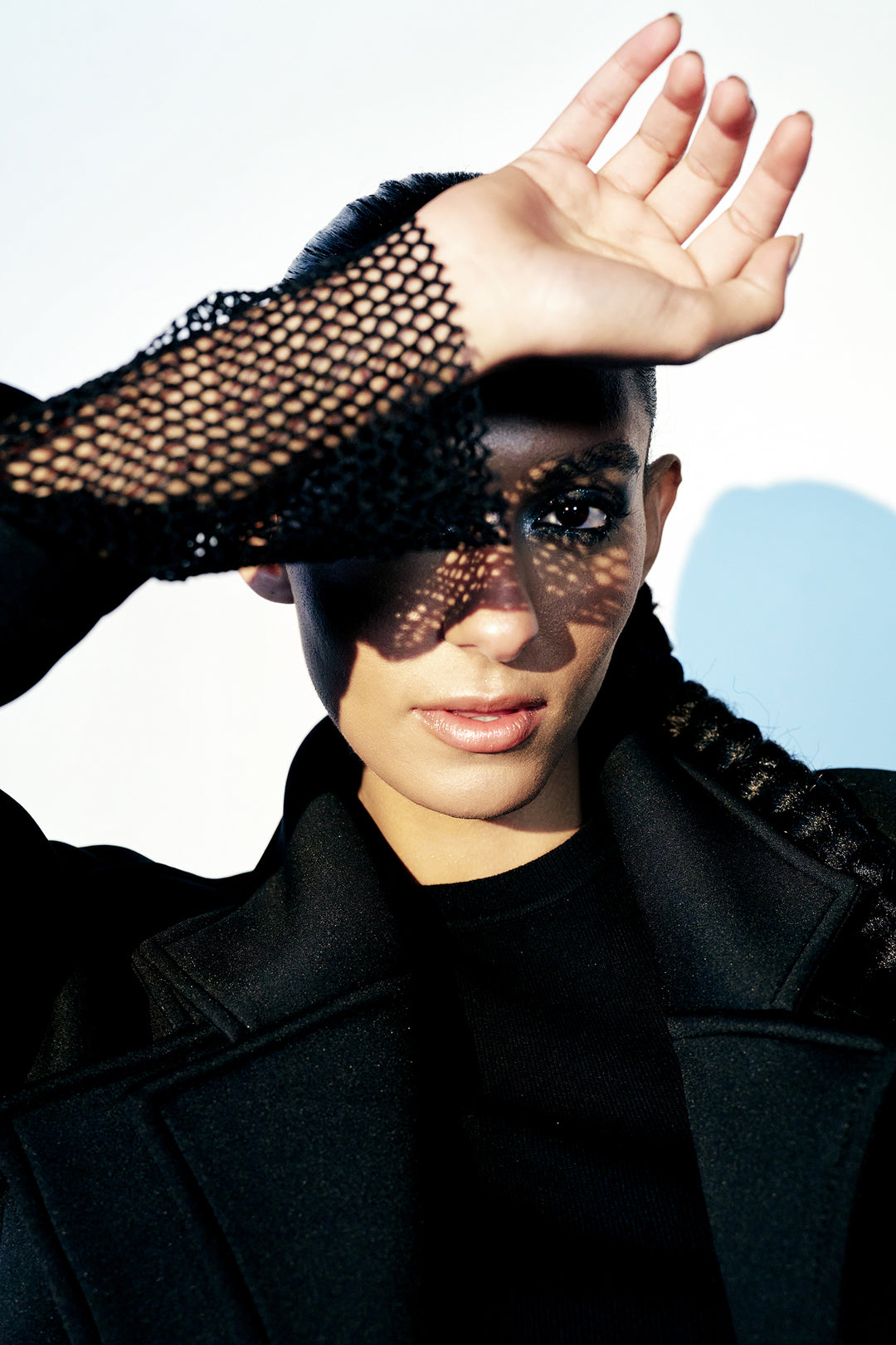 Black blazer jacket with fishnet sleeve