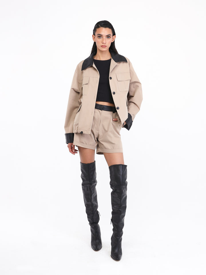 Beige shorts set with black leather outline