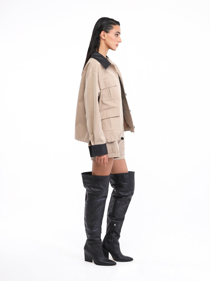 Beige shorts set with black leather outline