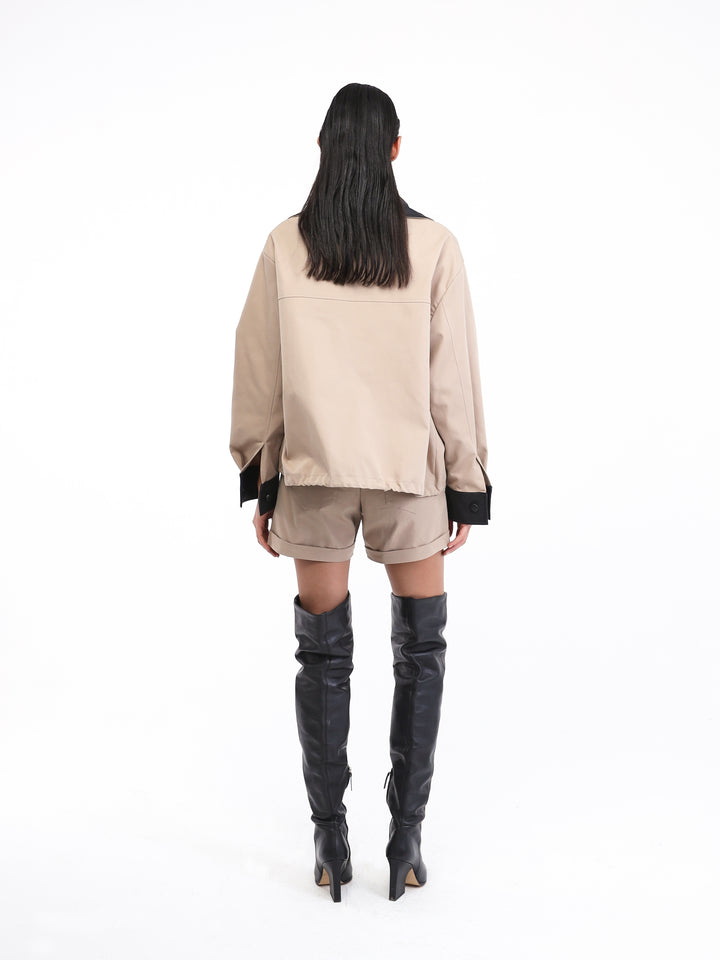Beige shorts set with black leather outline