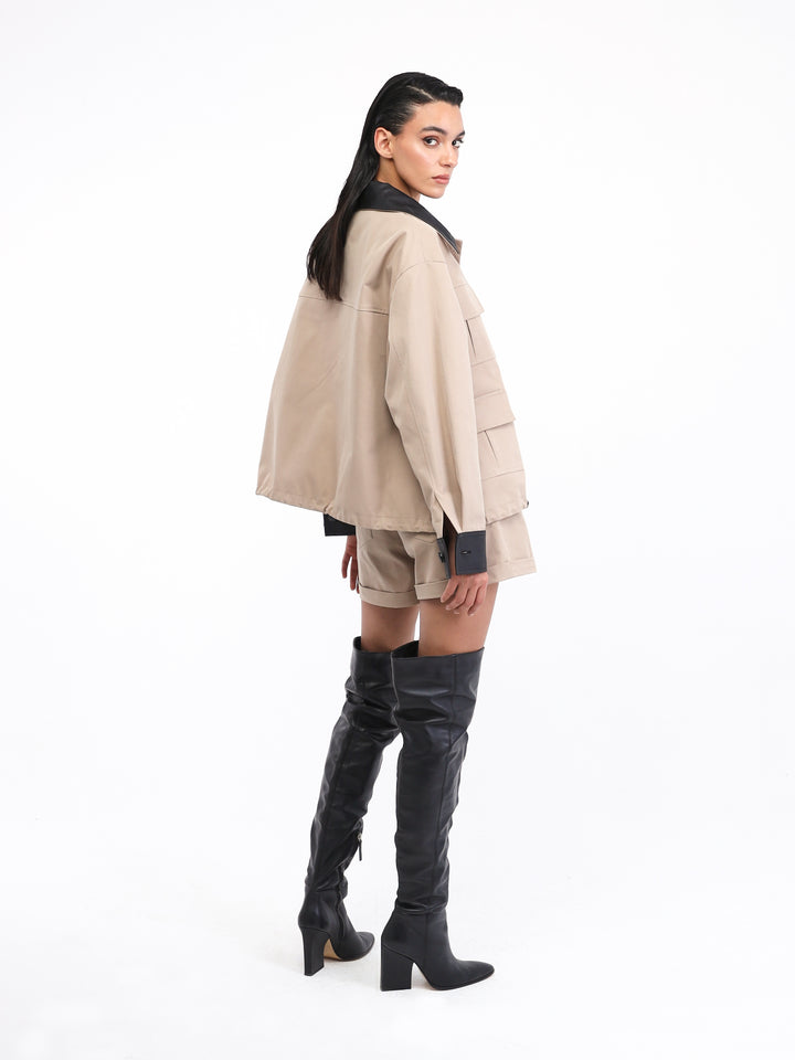 Beige shorts set with black leather outline