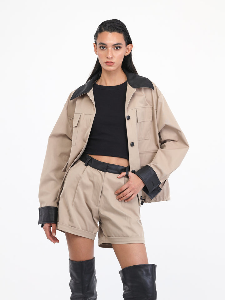 Beige shorts set with black leather outline